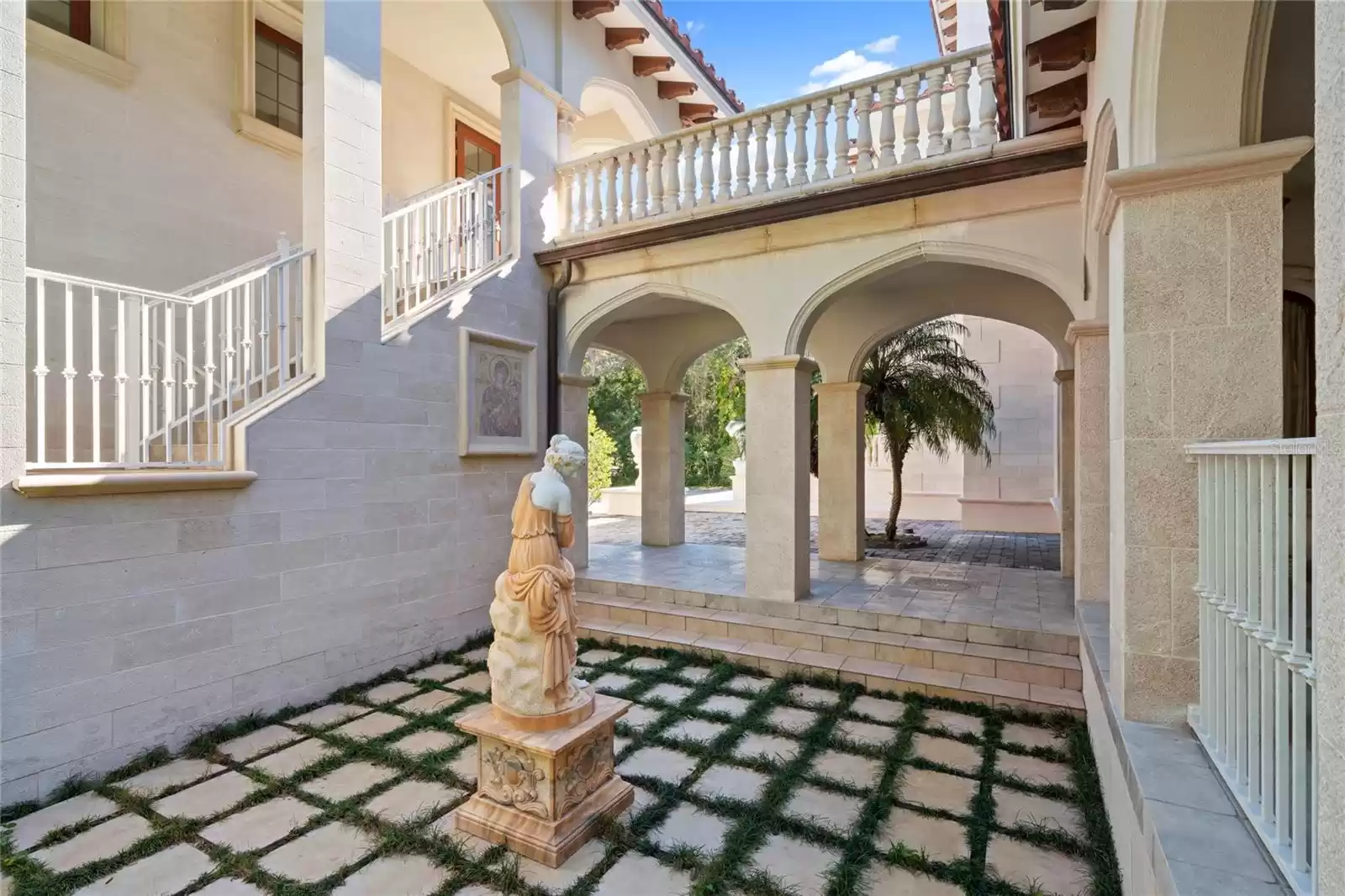 Courtyard separating main house and guest house