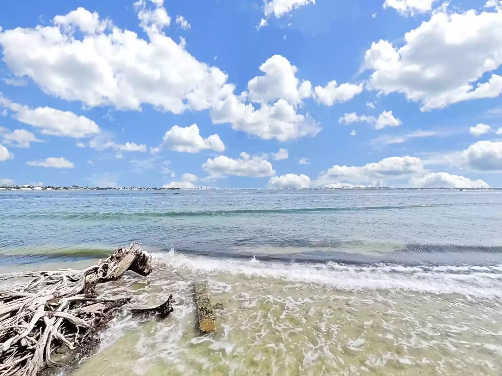 There is a very small beach to dip your toes!