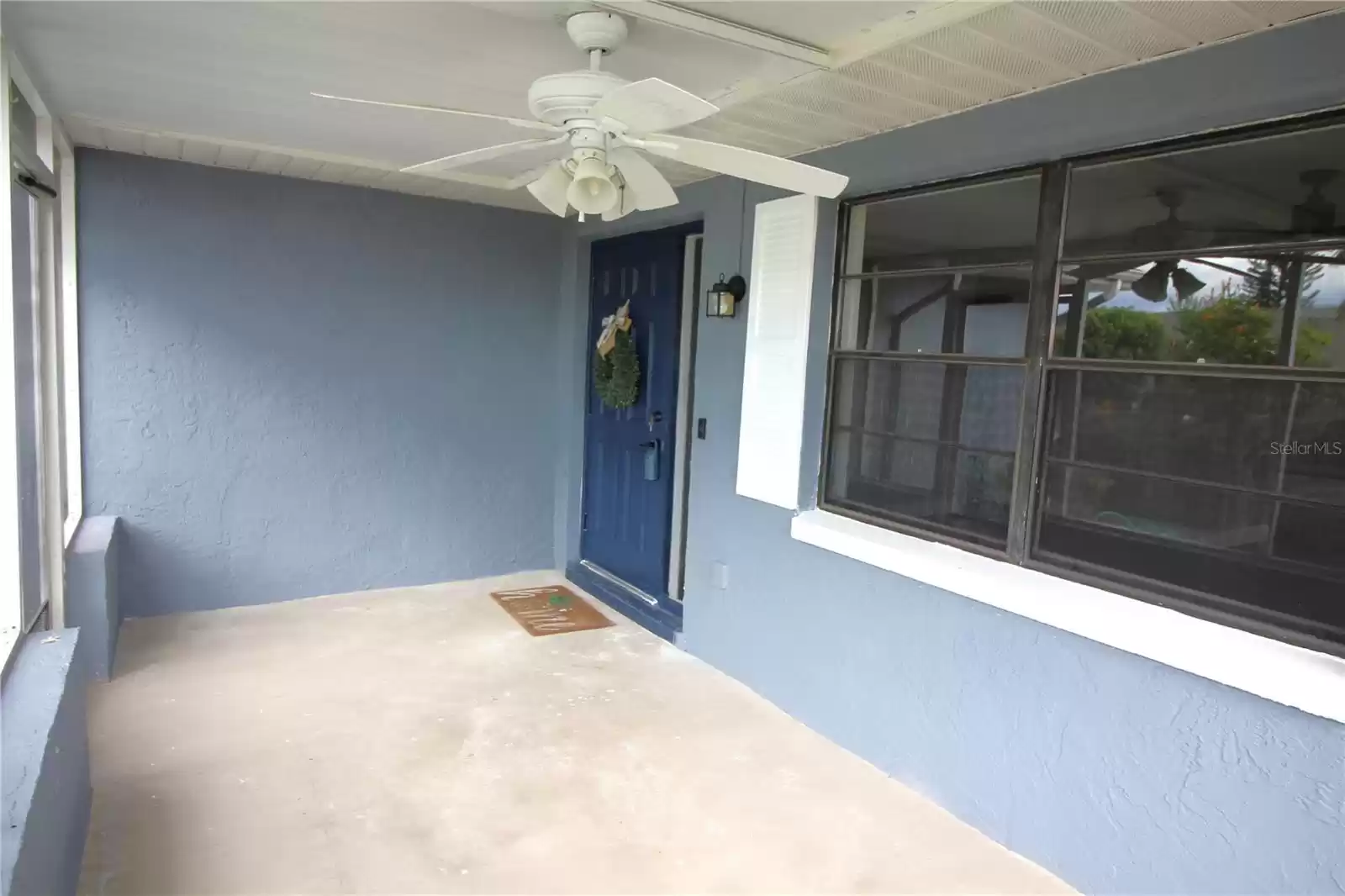 Front of home covered screened patio