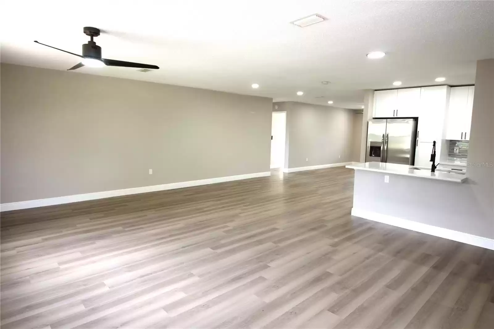 Family room.....hallway on left leads to two bedrooms and bath 2 on right side of home