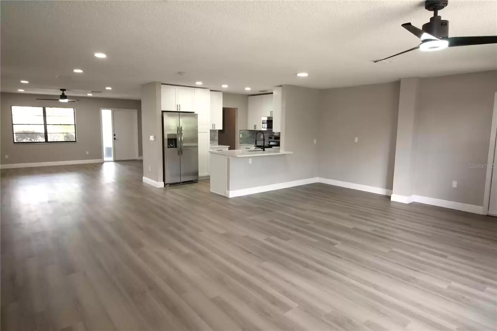 View of family room, dining room, and  living room