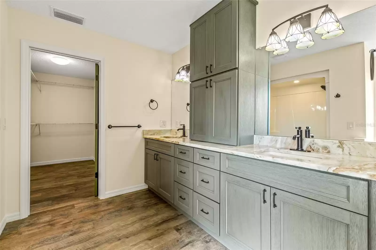 Owners bathroom and walk in closet, custom cabinets