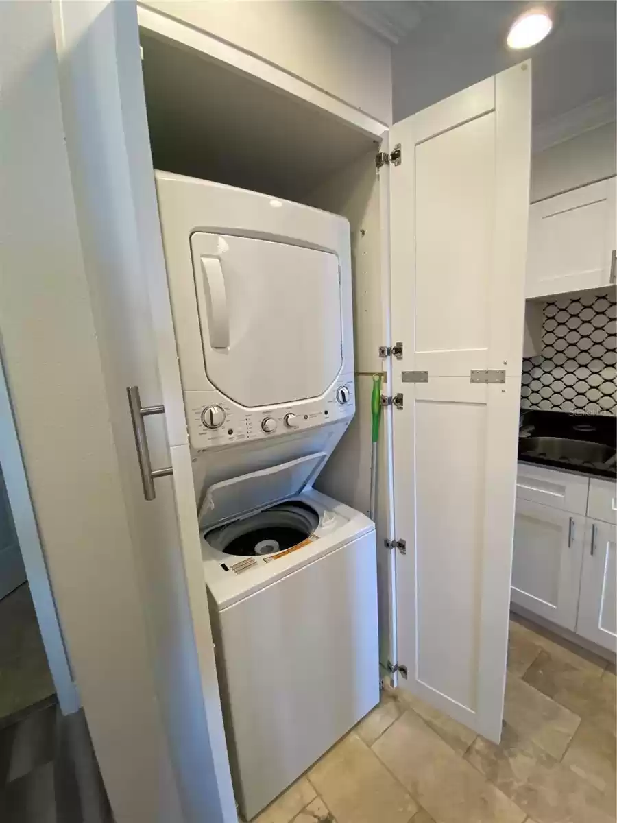 stack washer dryer off kitchen