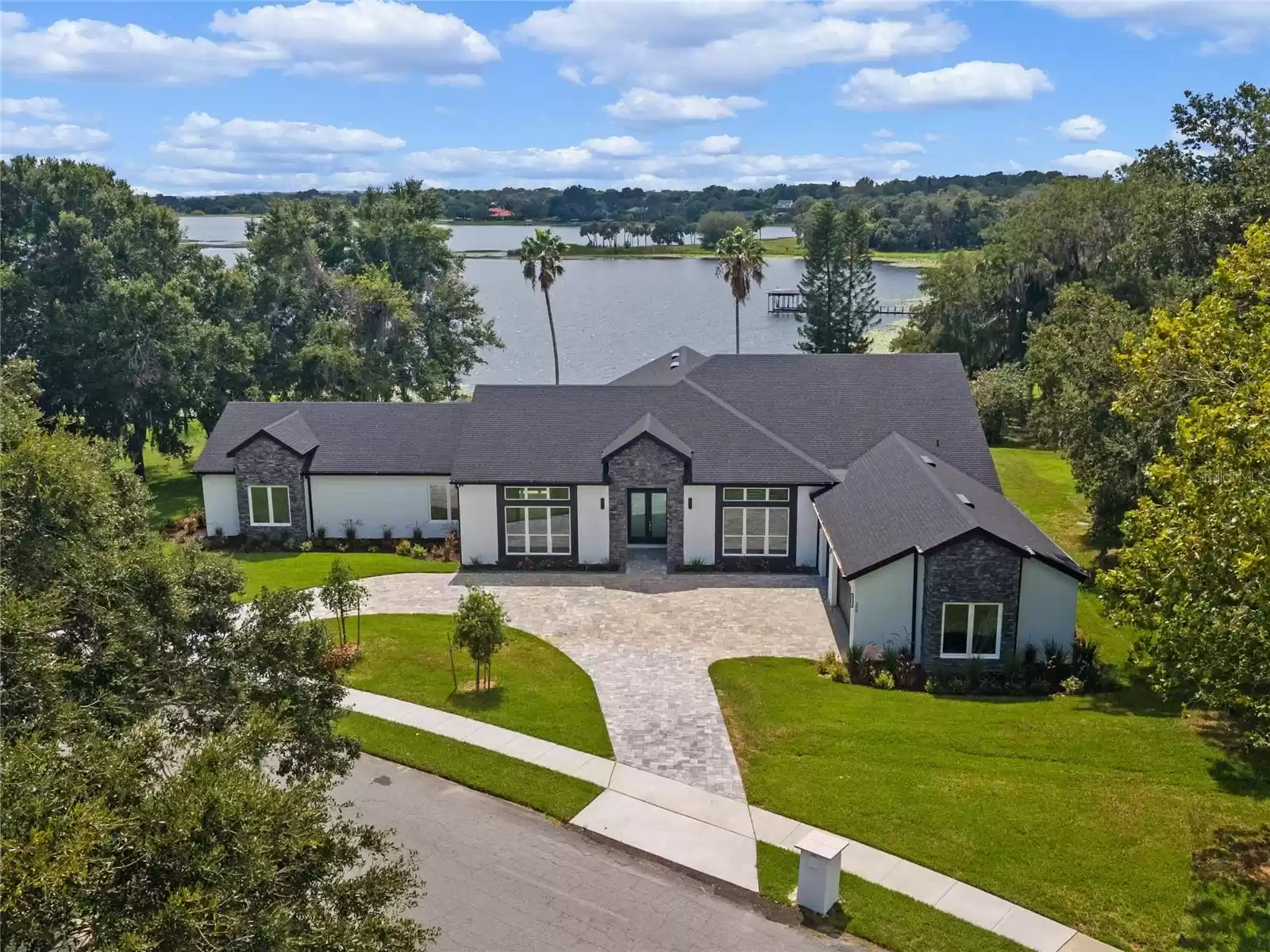 260 DEER ISLE DRIVE, WINTER GARDEN, Florida 34787, 4 Bedrooms Bedrooms, ,4 BathroomsBathrooms,Residential,For Sale,DEER ISLE,MFRO6135342