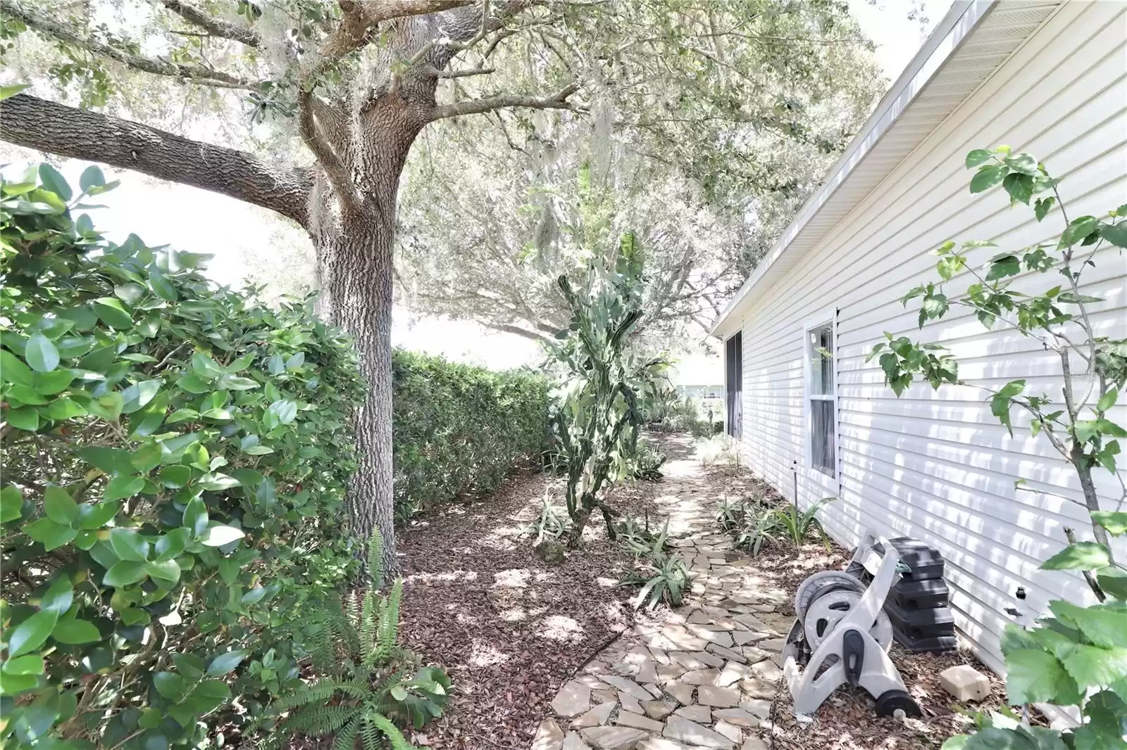 Stone path leads to backyard