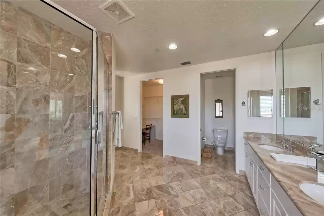 Master bath with large closet