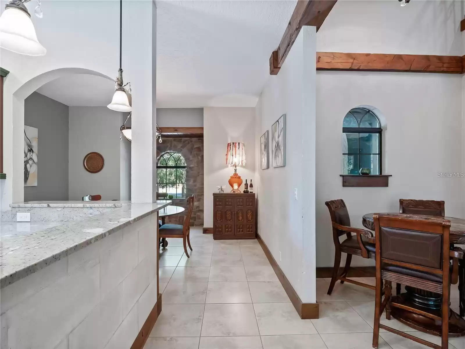 Kitchen adjoining dining room and dinette