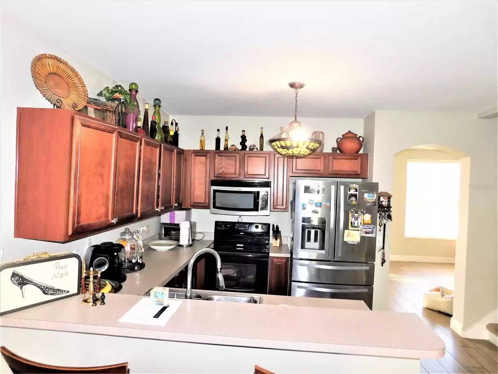 Wood Cabinets, Stainless Steel Refrigerator