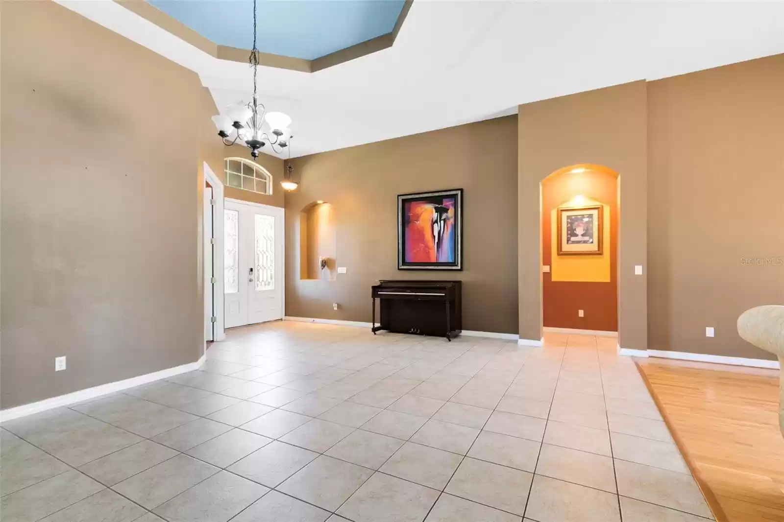 Dining Room and View of Primary Bedroom Entry