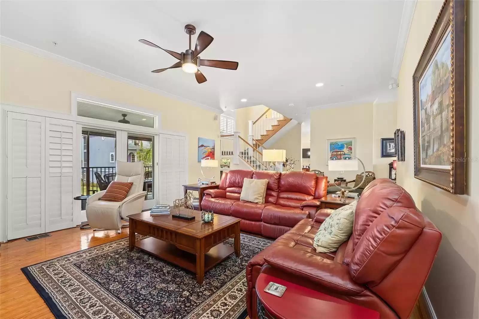 Livingroom with gas fireplace and balcony