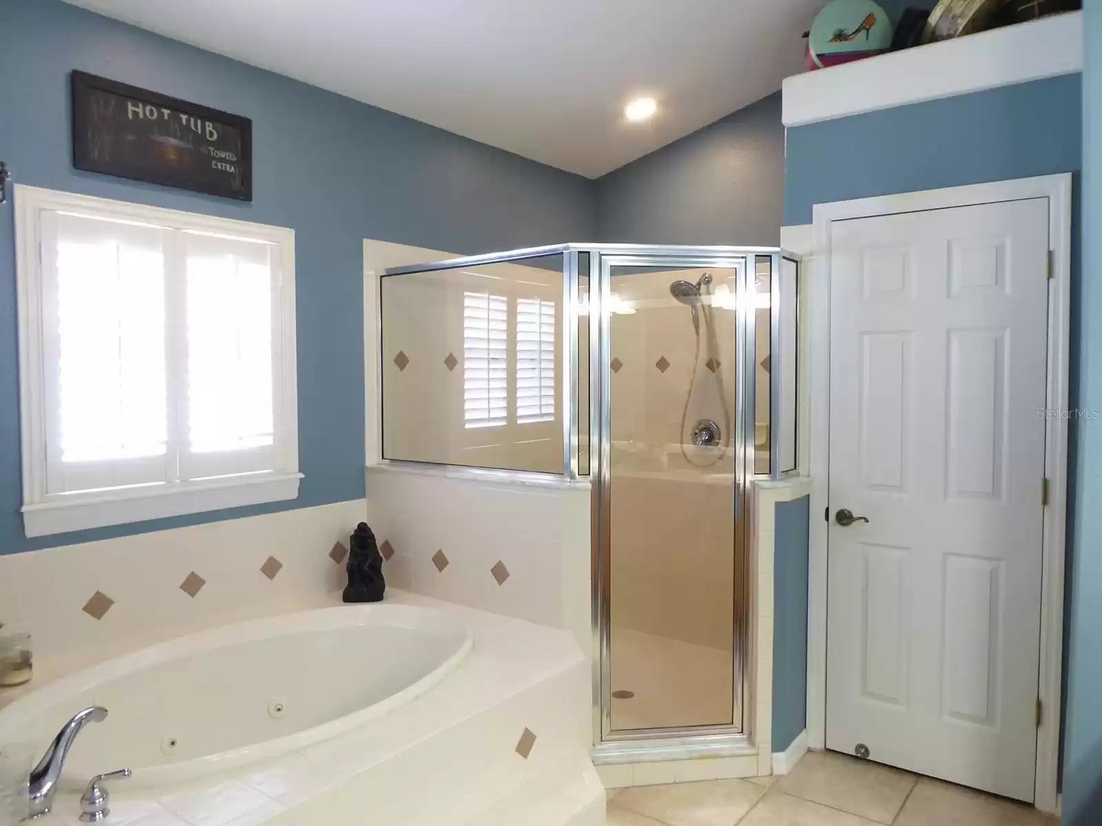 Primary bathroom tub and walk in shower