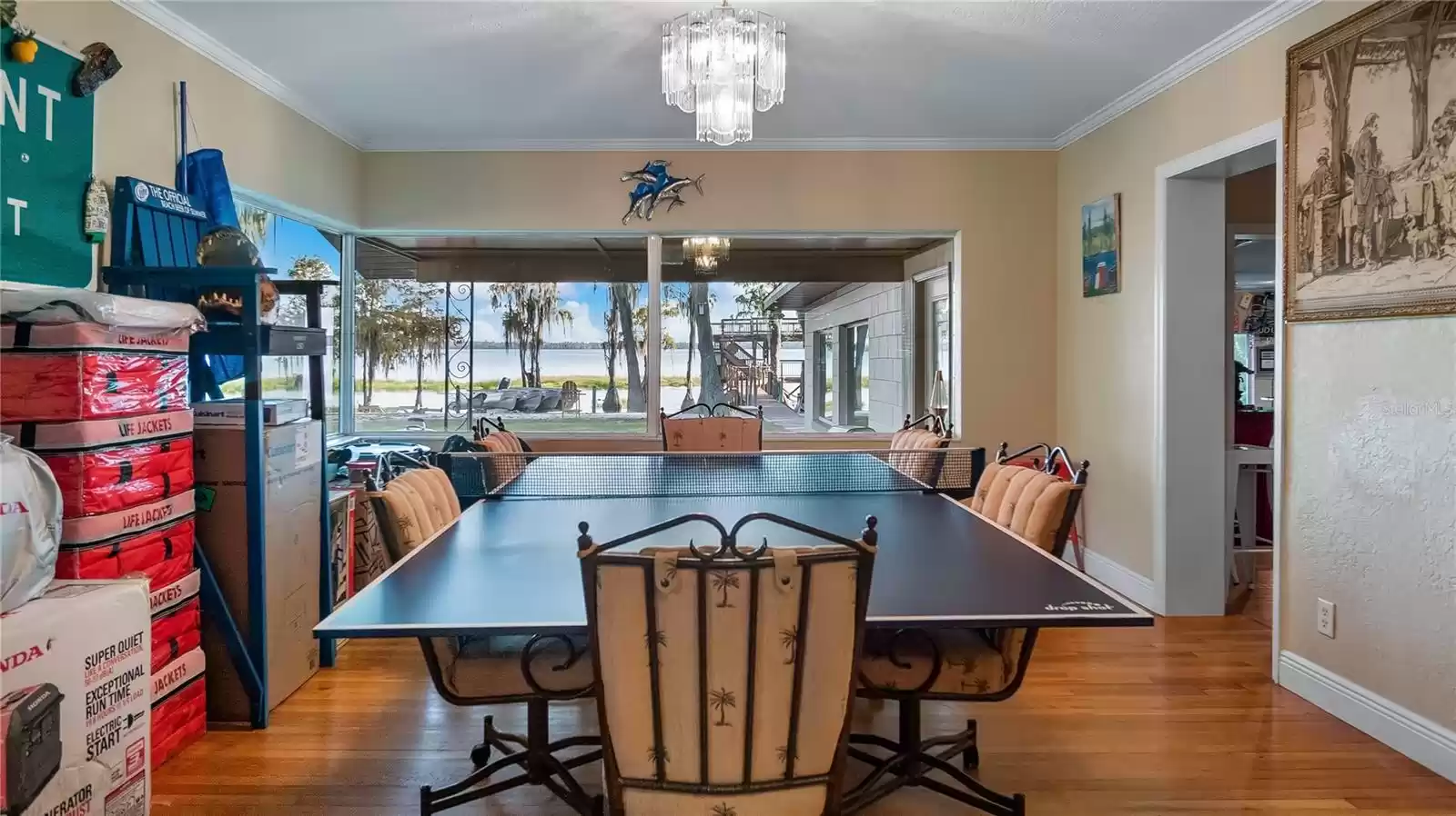 Dining room with large lake view windows