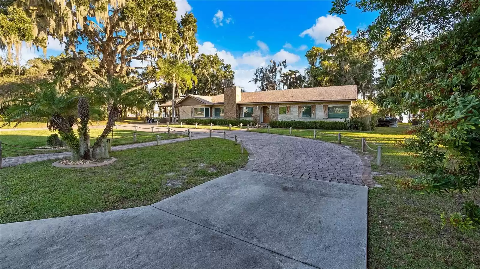 Large circular brick paver driveway