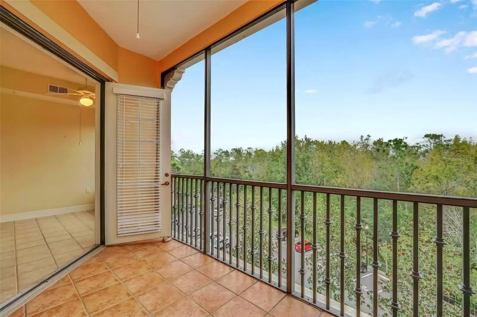 Screened Patio Overlooking Nature Preserve with Tile Floor