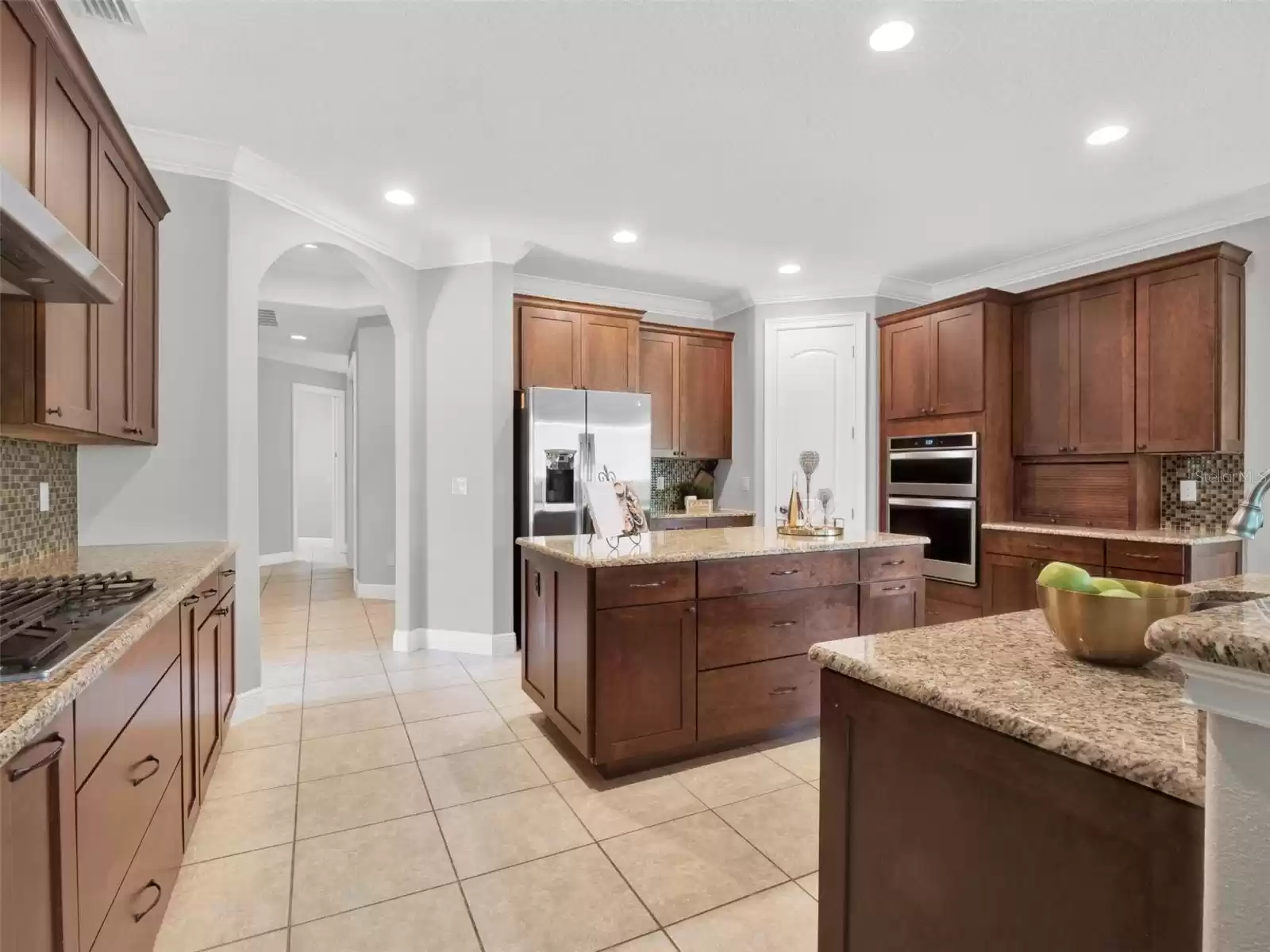 Kitchen with stone countertops and high-end 42-inch cabinets