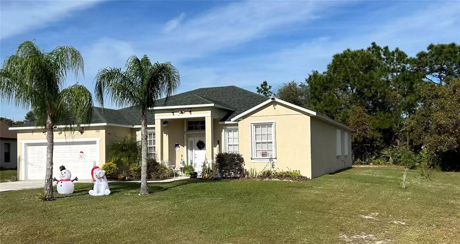 RIGHT SIDE FRONT, SHUTTERS ON WINDOWS