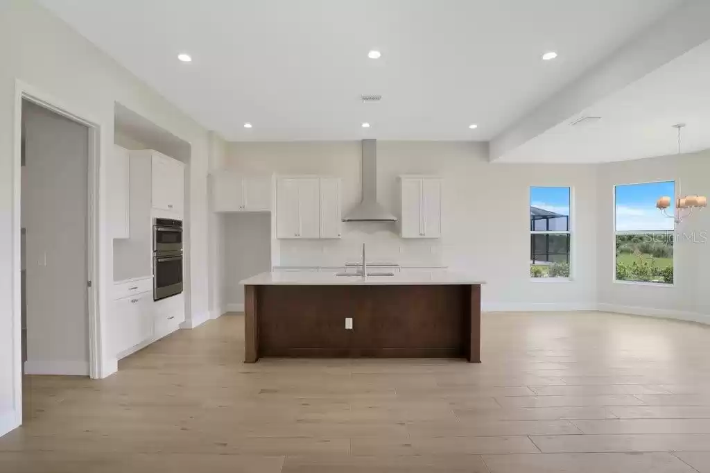 Gourmet Kitchen with Double Oven, Cooktop, Range Hood and Huge Island