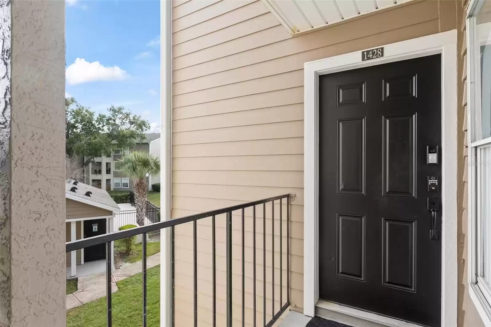 Beautiful Move-In Ready Condo is an End Unit Located on the Second Level with a Key Pad Entry, Ready for You to Make it Your New Home or Investment Property