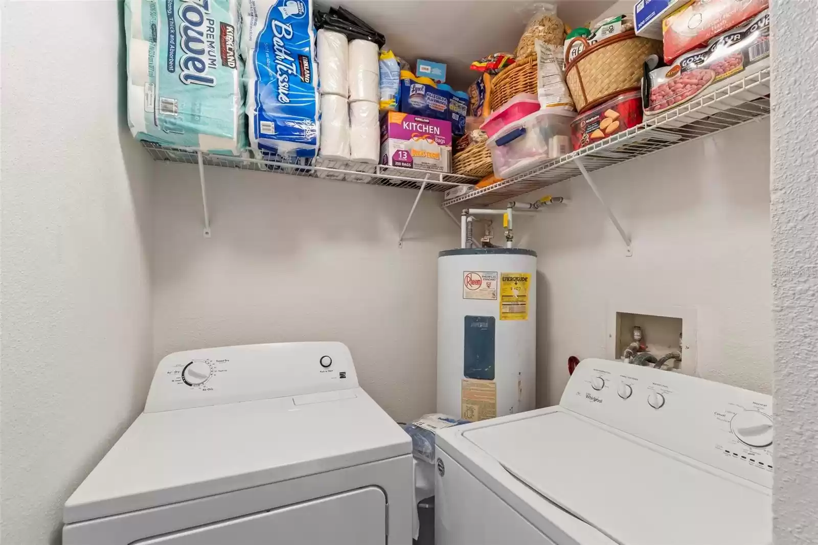 Convenient Interior Utility Room with Full Size Washer and Dryer, 40 Gallon Rheem Water Heater and All New Shelving for Additional Storage and a Place for Everything along with a New Modern Style Flush Mount Light Fixture Recently Installed