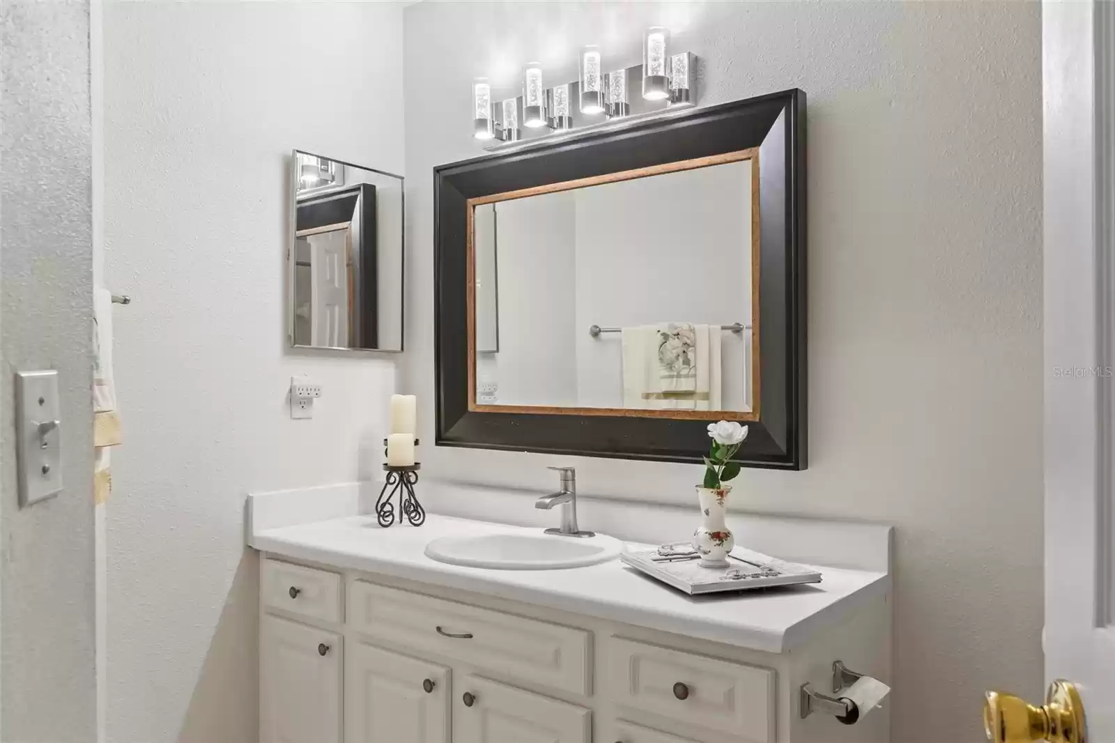 En-Suite Master Bath was Recently Renovated with an Upgraded Vanity and Stone Counter, Modern Brushed Stainless Mohen Faucet, Brushed Chrome Fixtures and a New Gorgeous Artika Chrome 4 LED Light Fixture