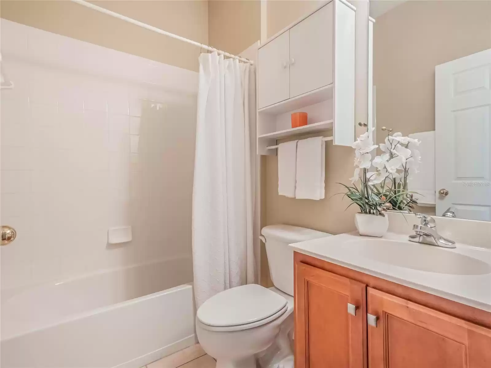 Bathroom #2 w/ single sink & tub/shower combo