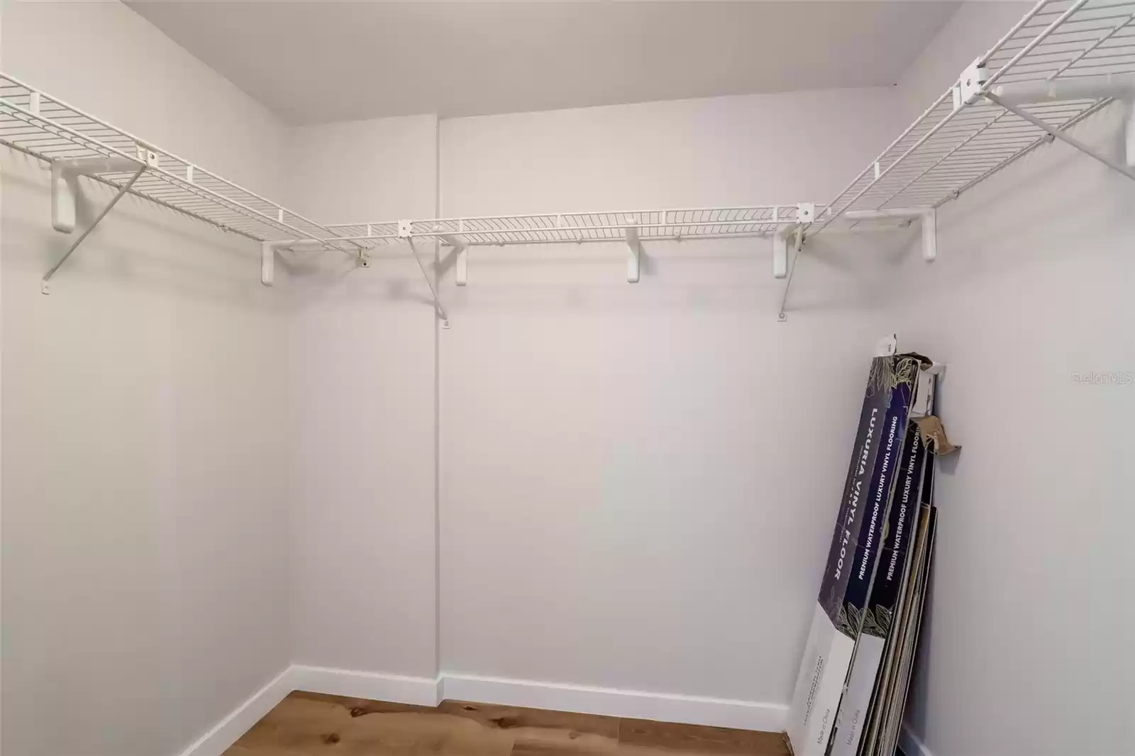 Walk in closet - primary bedroom (extra flooring available)