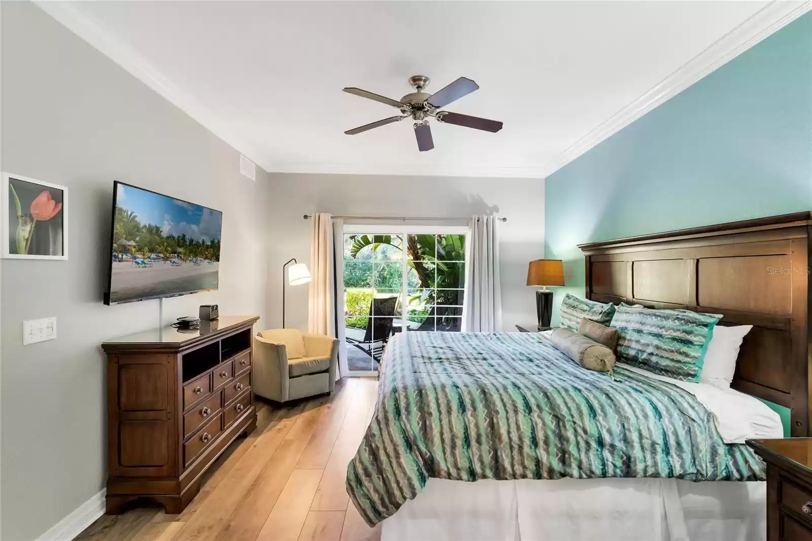 Primary bedroom with access to the patio