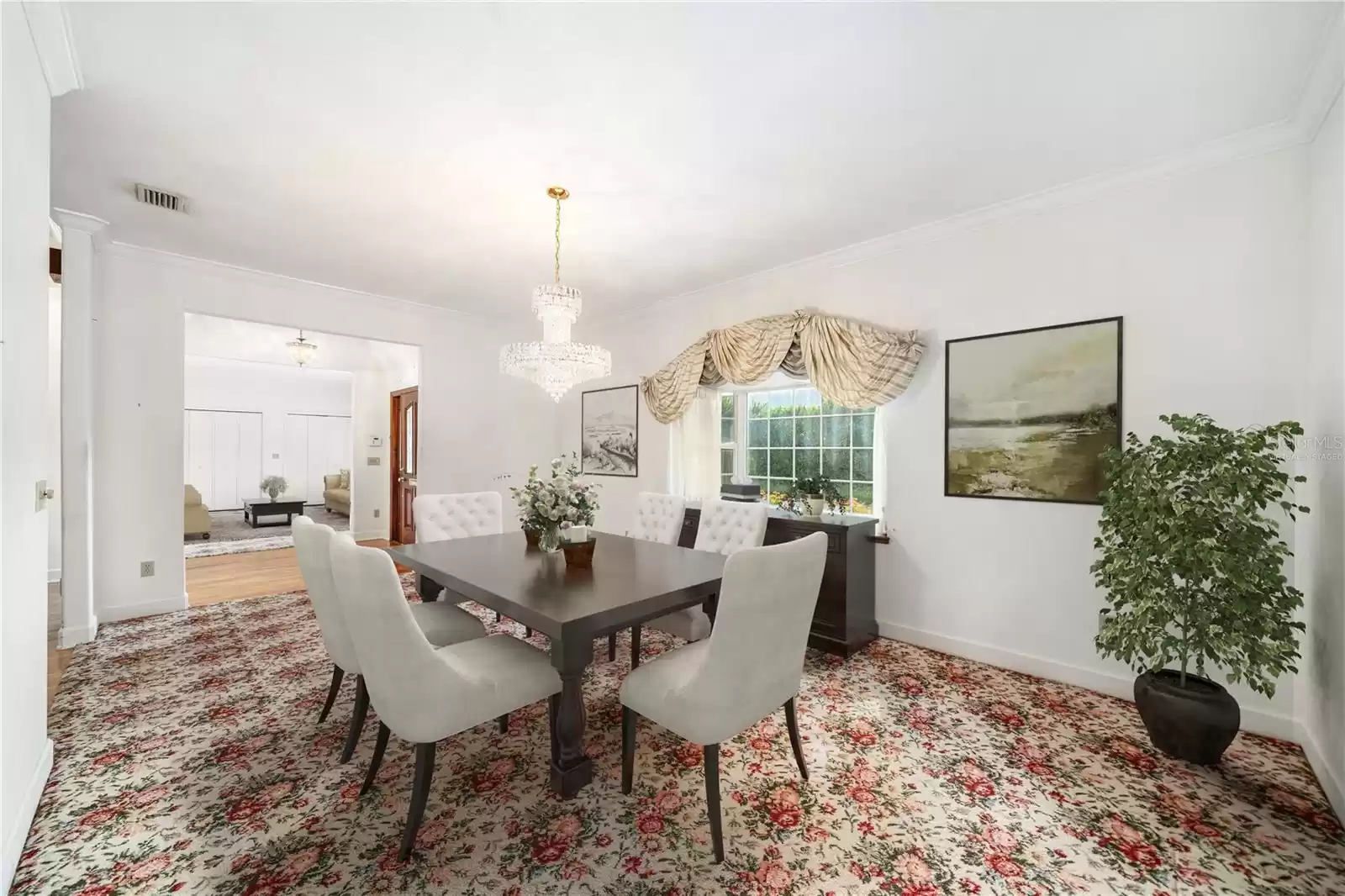 Formal dining room virtually staged.