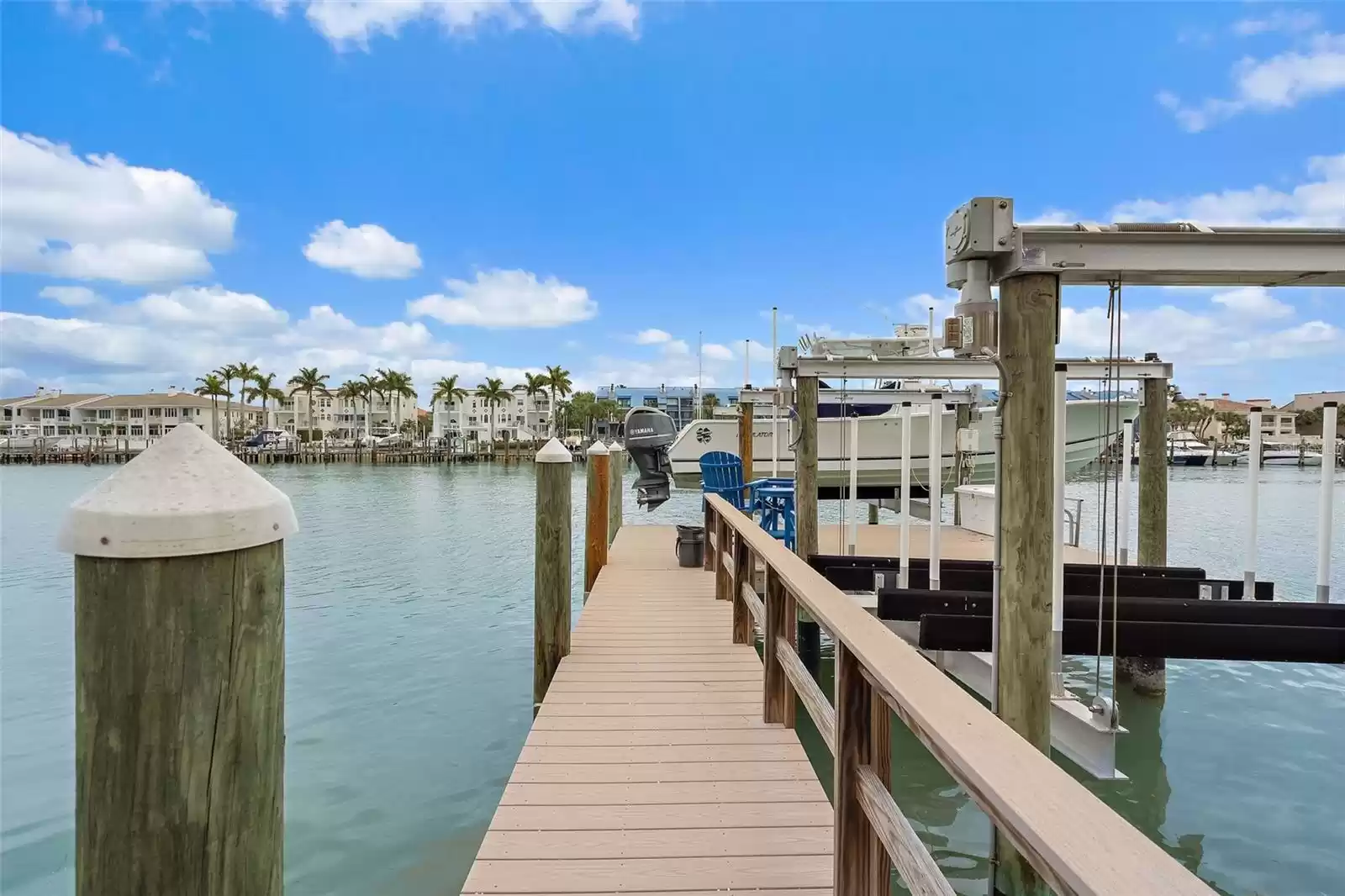 Composite dock with two boat lifts.