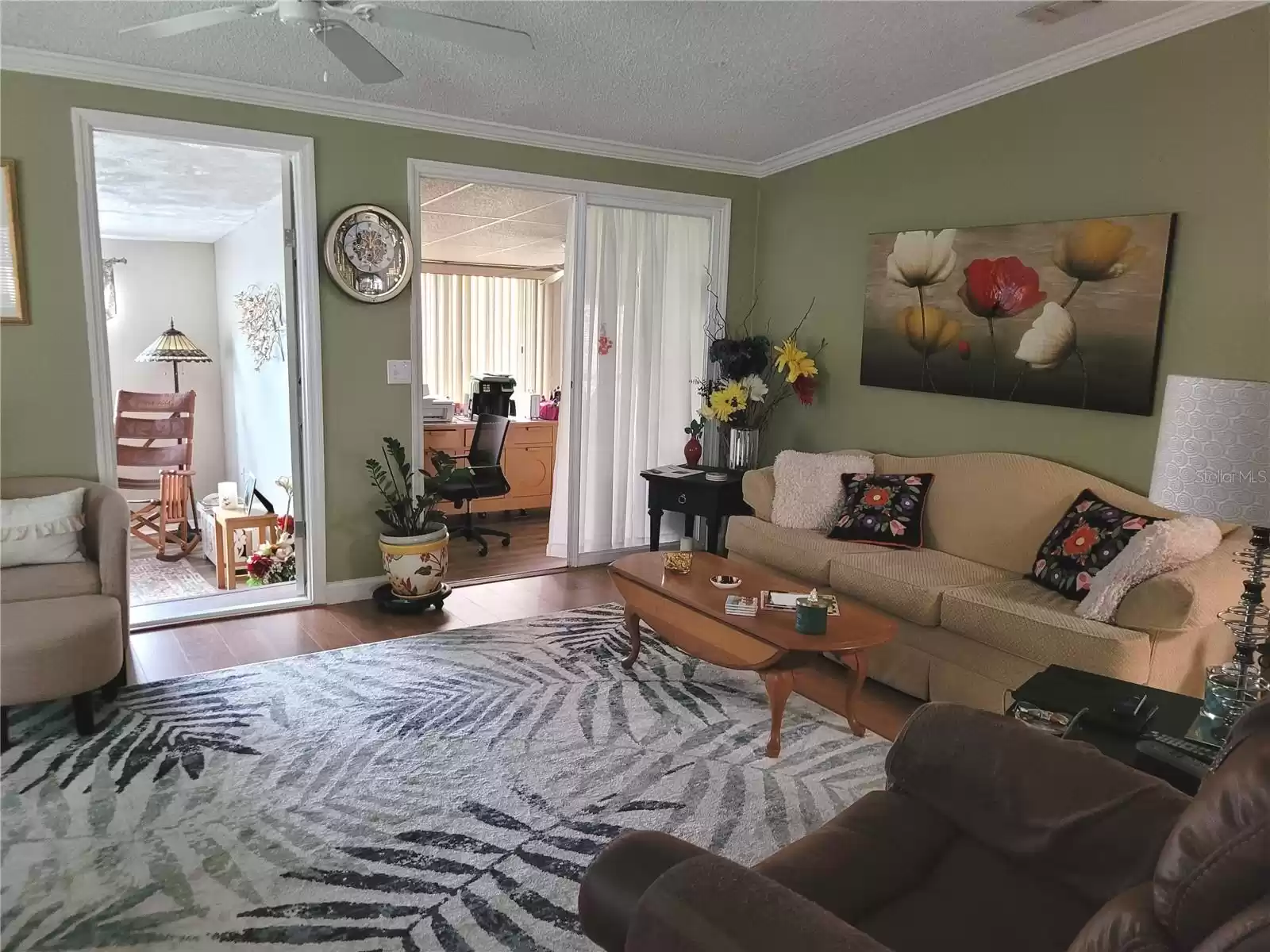 Living room  (entry to bedroom 3 and to the bonus room).