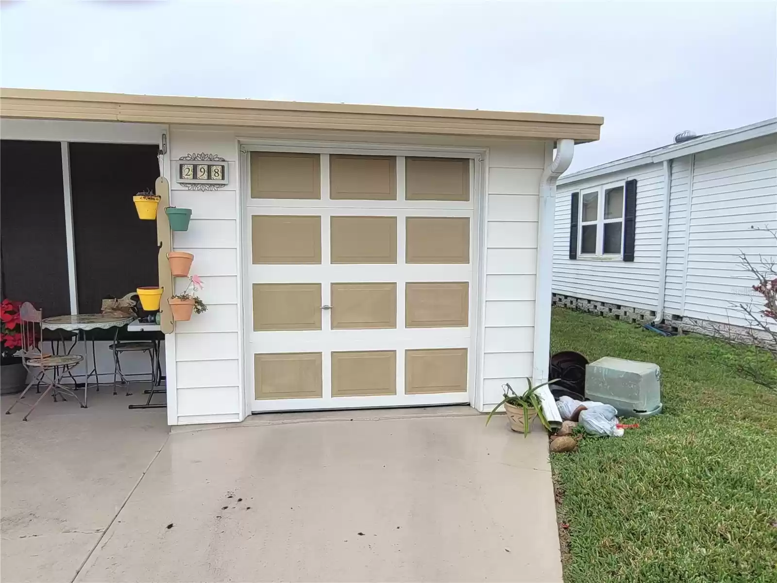 Garage door and the golf cart parking.