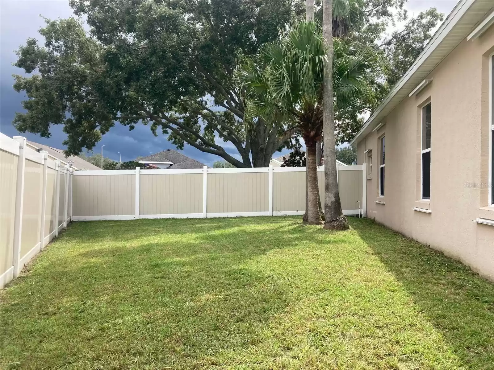 Back Yard View- Beautiful PVC Fence to