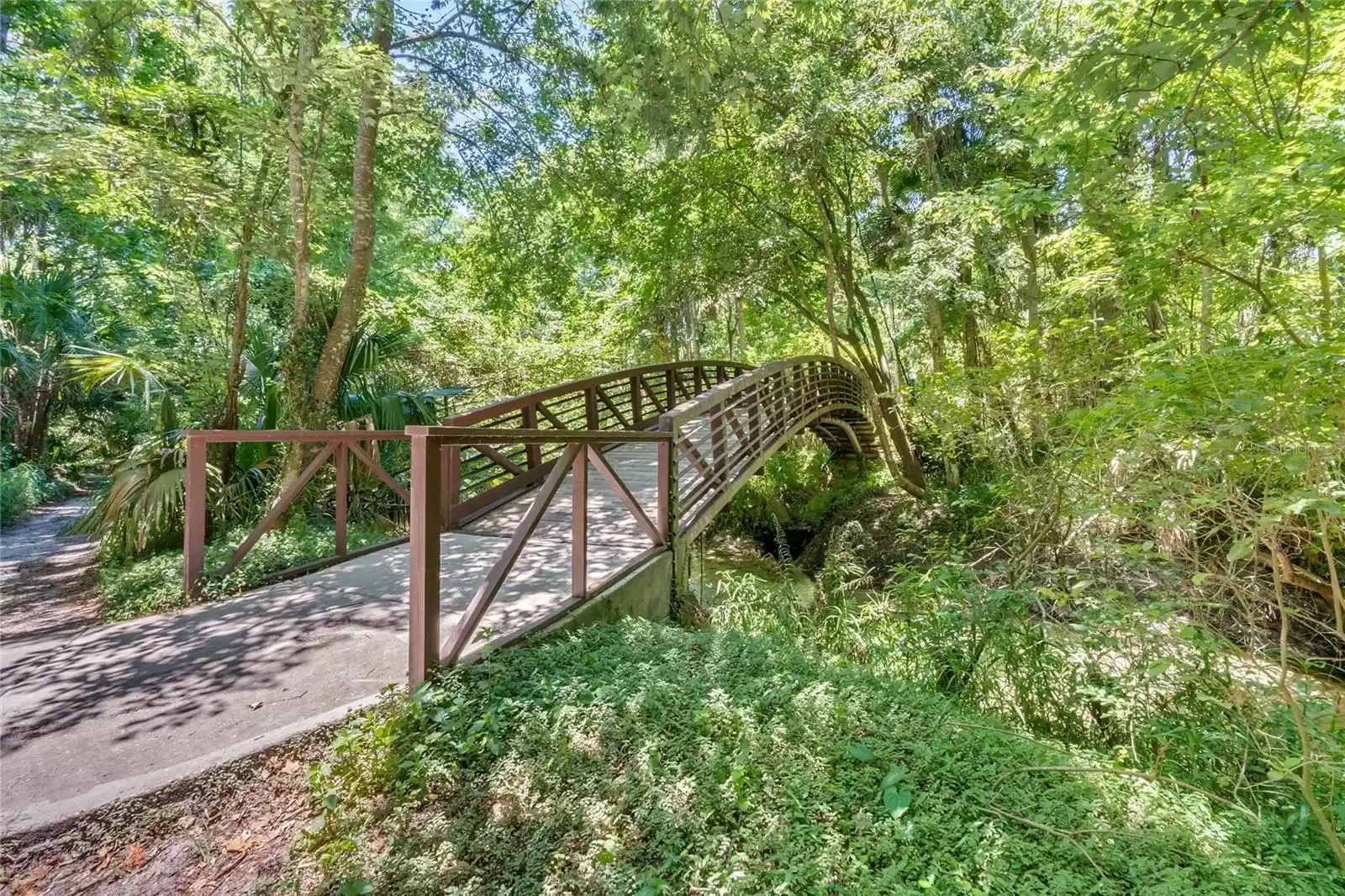 Take a scenic walk over picturesque bridges  down to the springs