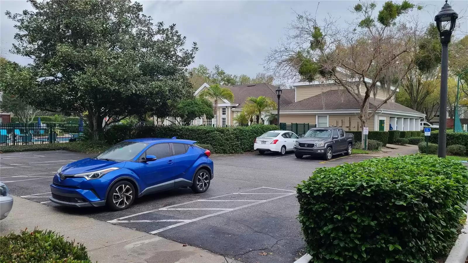 Parking behind the clubhouse.