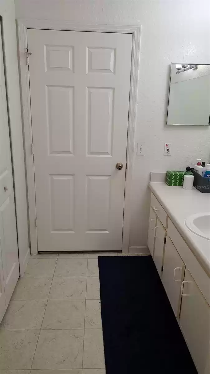 2nd bathroom door to second bedroom.