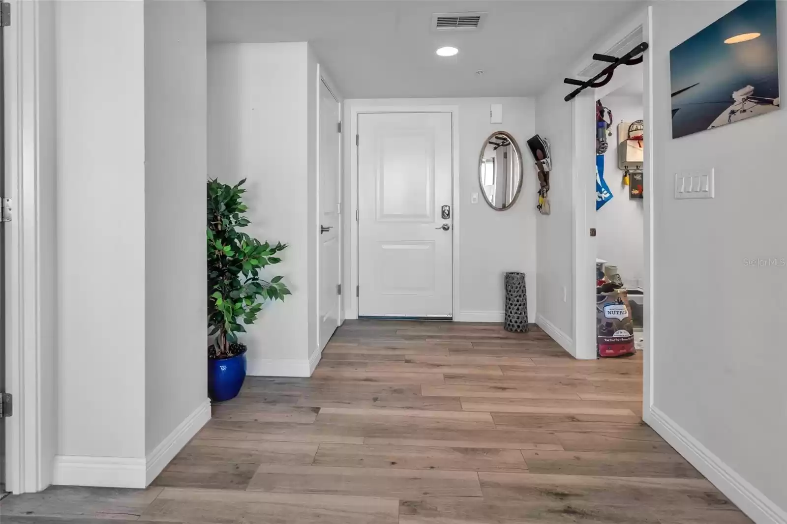 Entryway with large laundry room/storage space