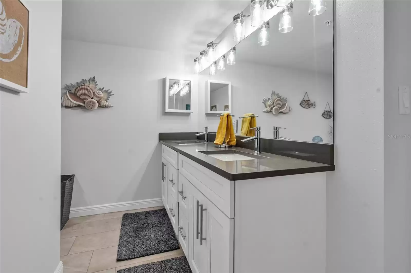 Primary ensuite bathroom with dual sinks