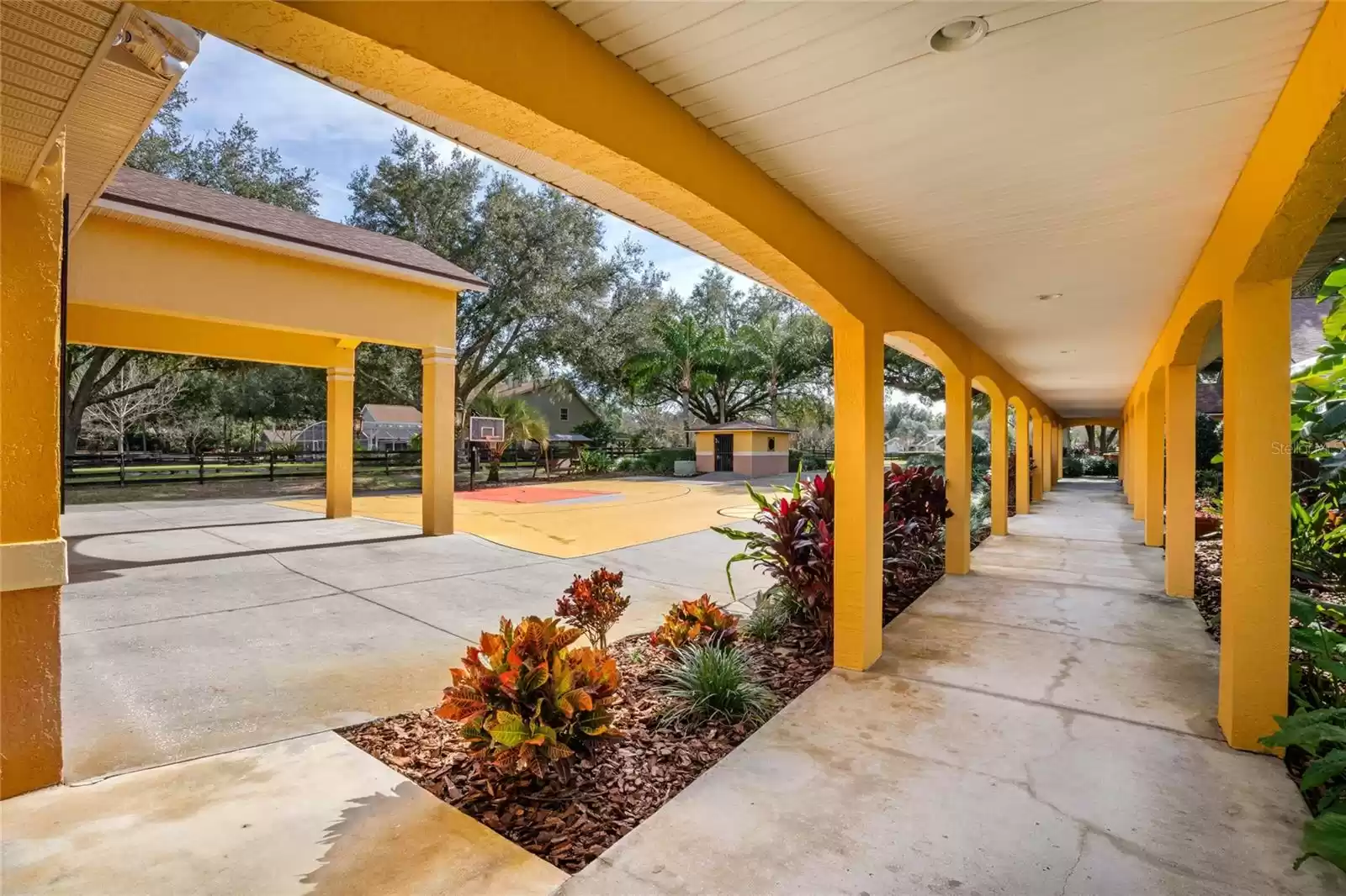 Walk way from the Garage Side Door to the Front of the Property