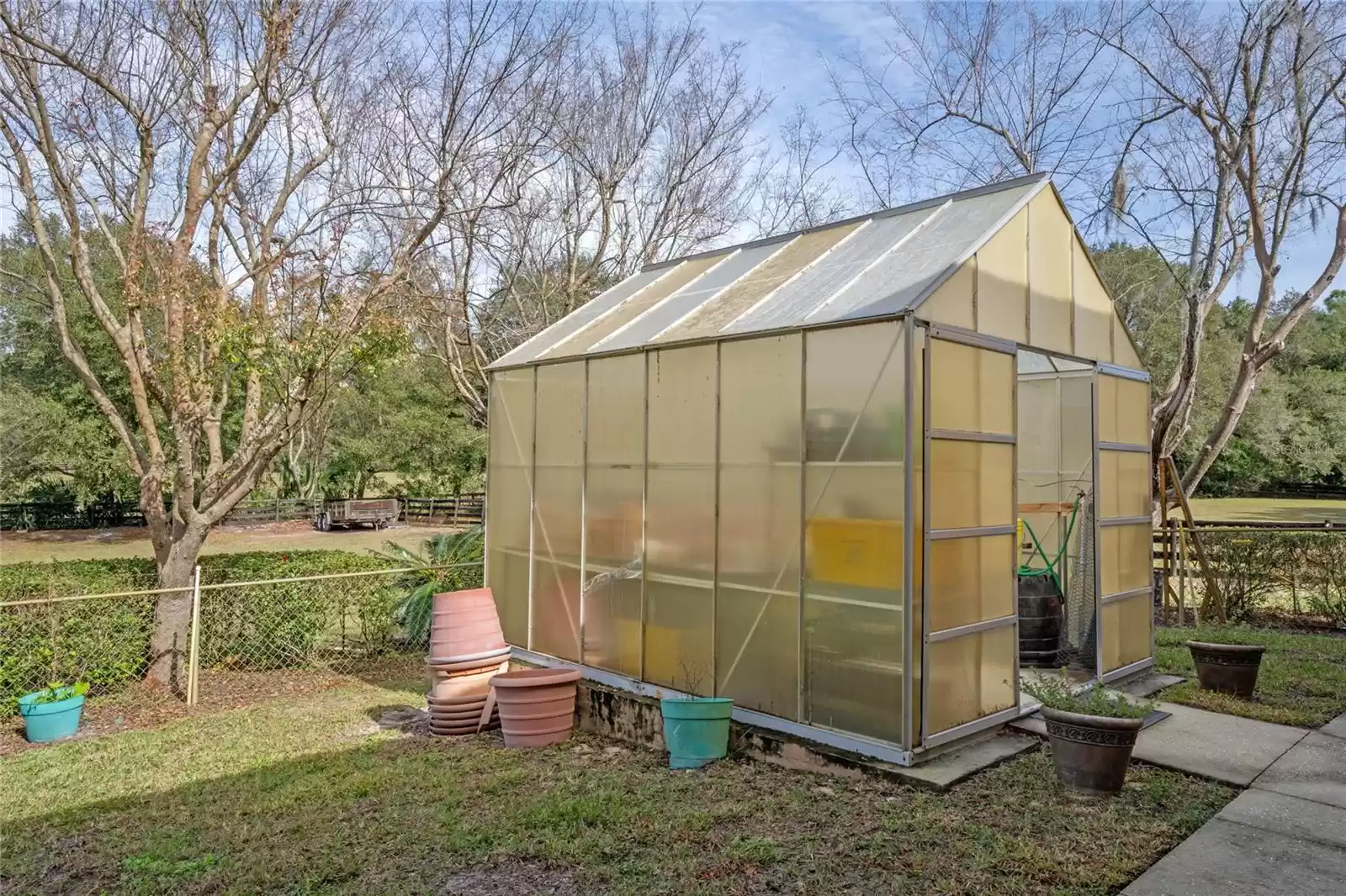 Greenhouse behind the garage