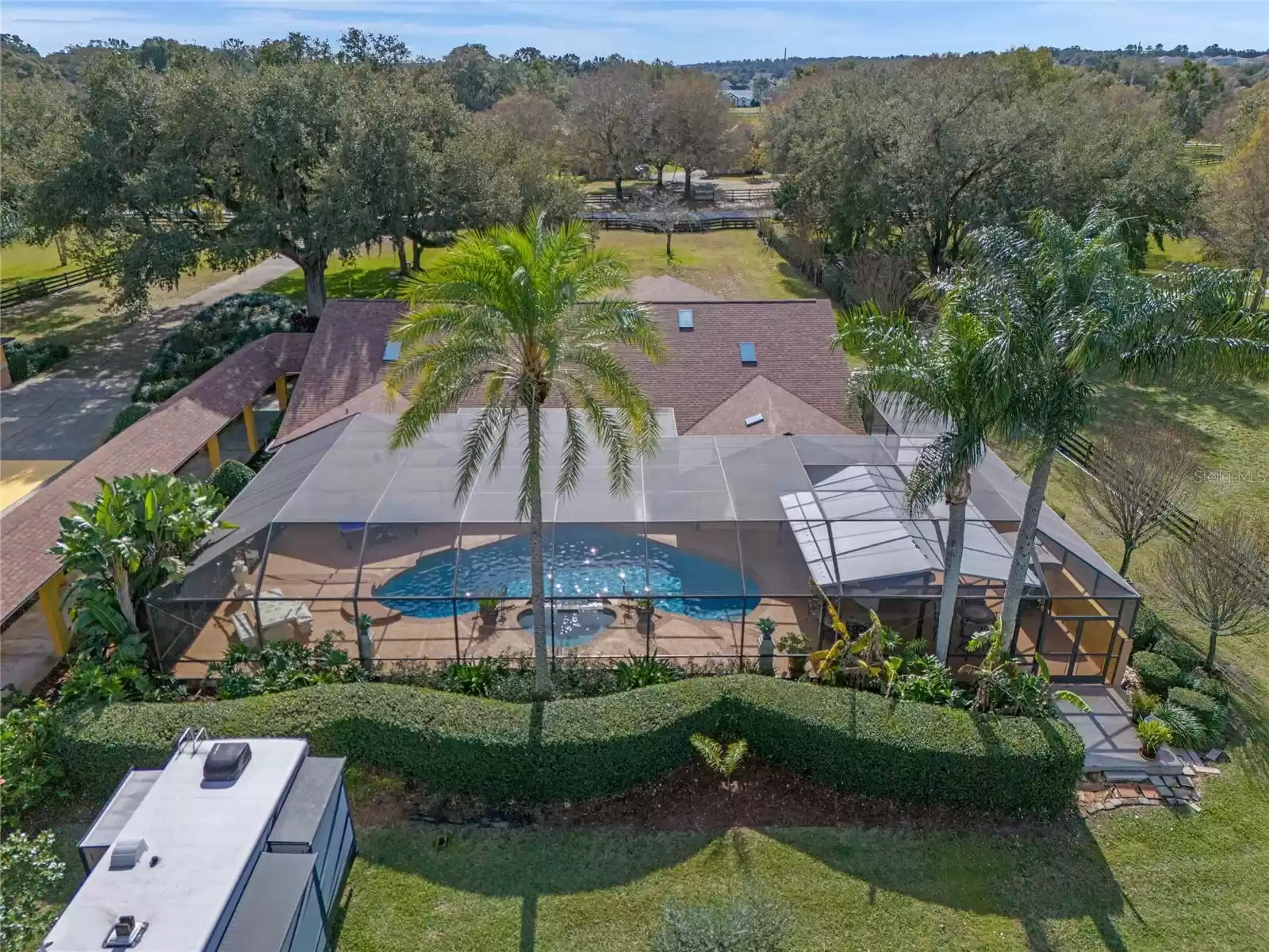 Drone view of Pool and Home