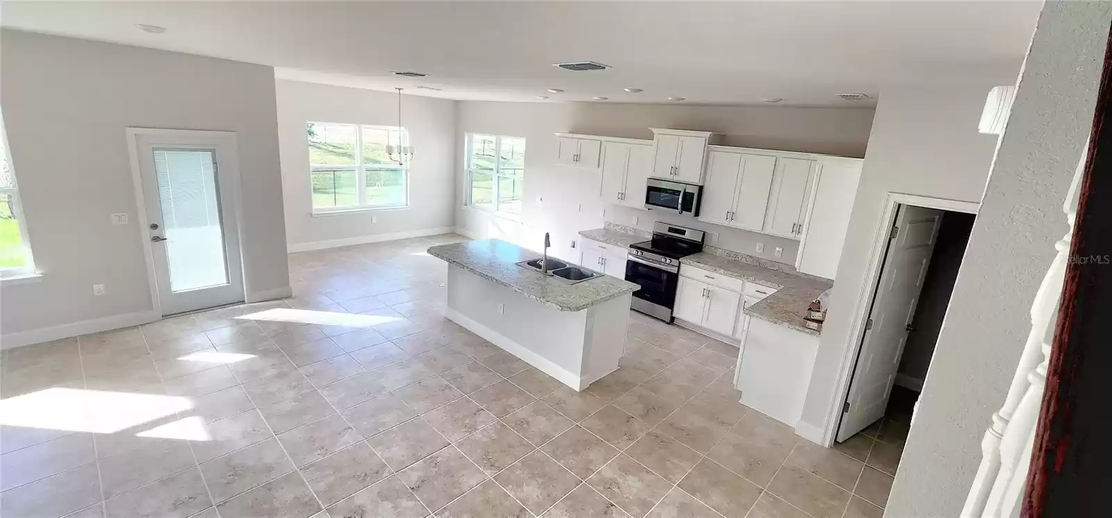 304 KRENSON BAY LOOP, WINTER HAVEN, Florida 33881, 4 Bedrooms Bedrooms, ,2 BathroomsBathrooms,Residential,For Sale,KRENSON BAY,MFRO6176082