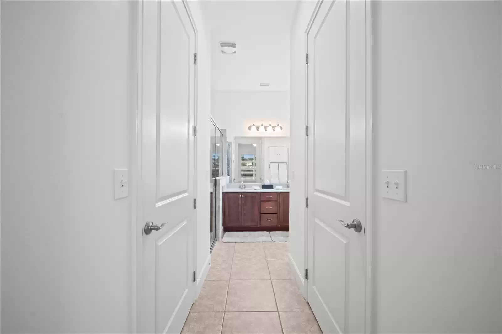 CLOSETS AND PRIMARY BATH ENTRANCE