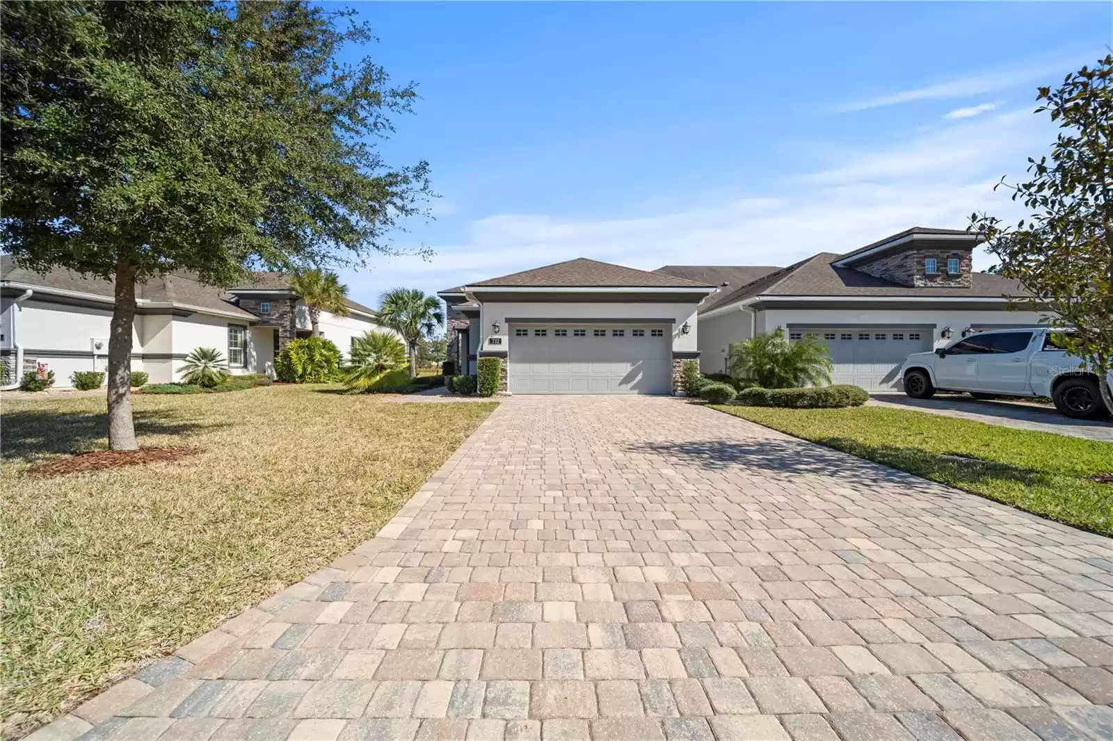 EXTERIOR FRONT GARAGE AND DRIVEWAY