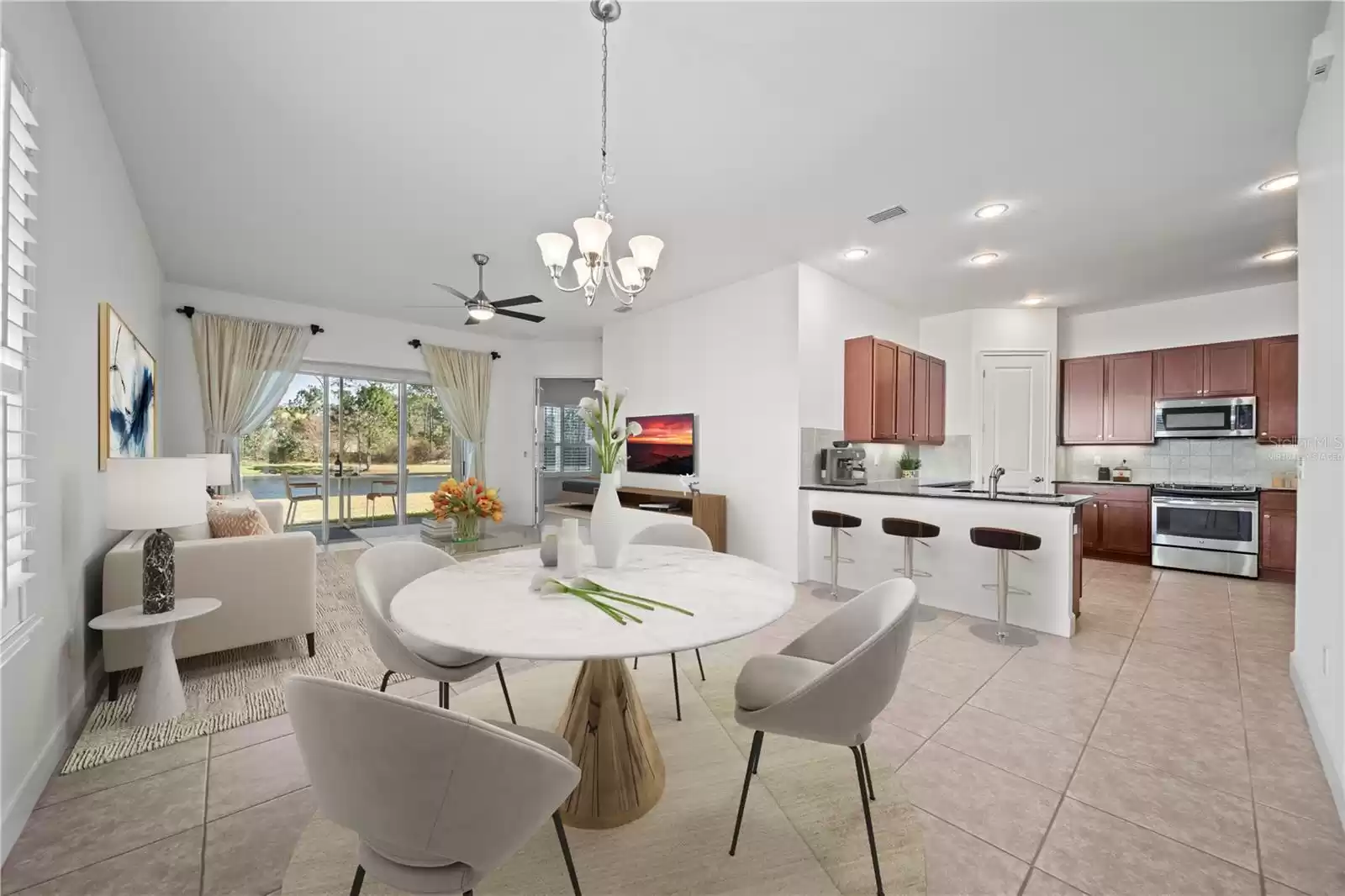 FAMILY/DINING ROOM AND KITCHEN AREA- VIRTUALLY STAGED