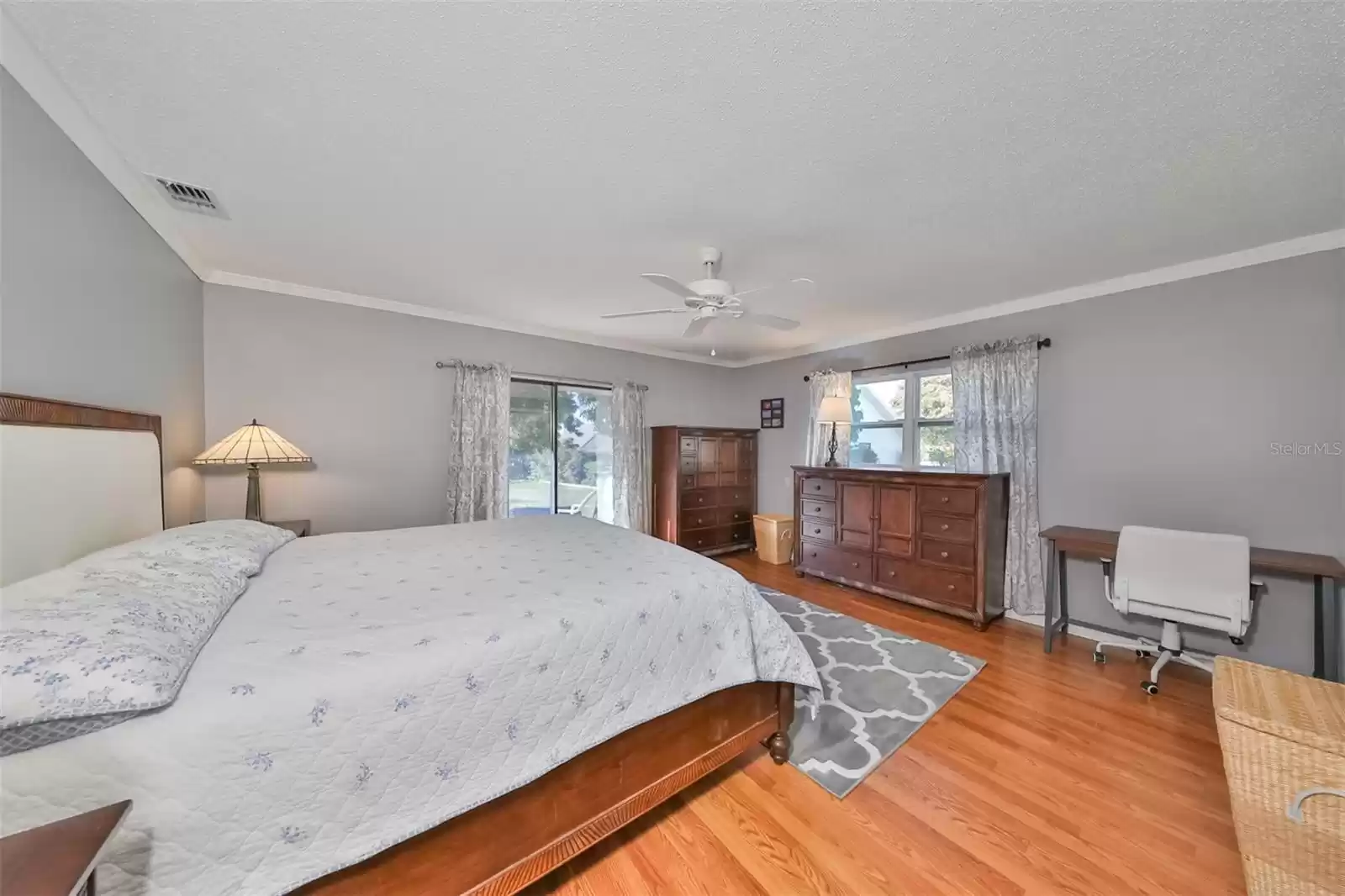 Primary Bedroom with a walkout sliding glass door