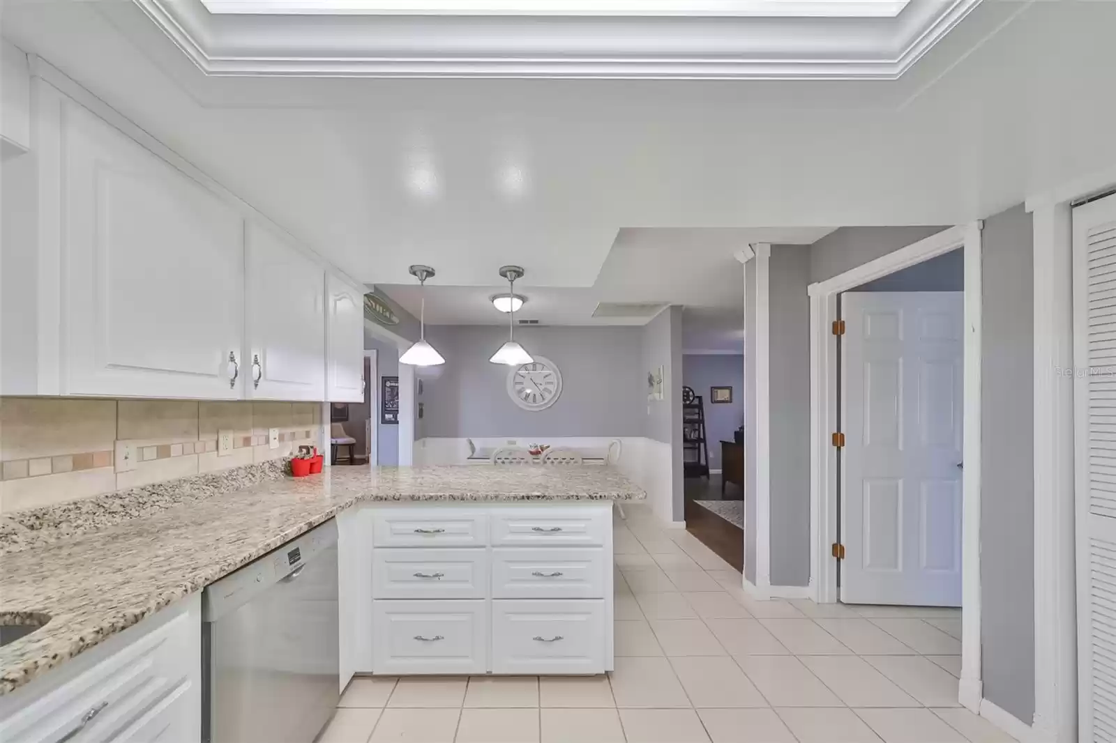 Kitchen. To the right side is the Laundry room