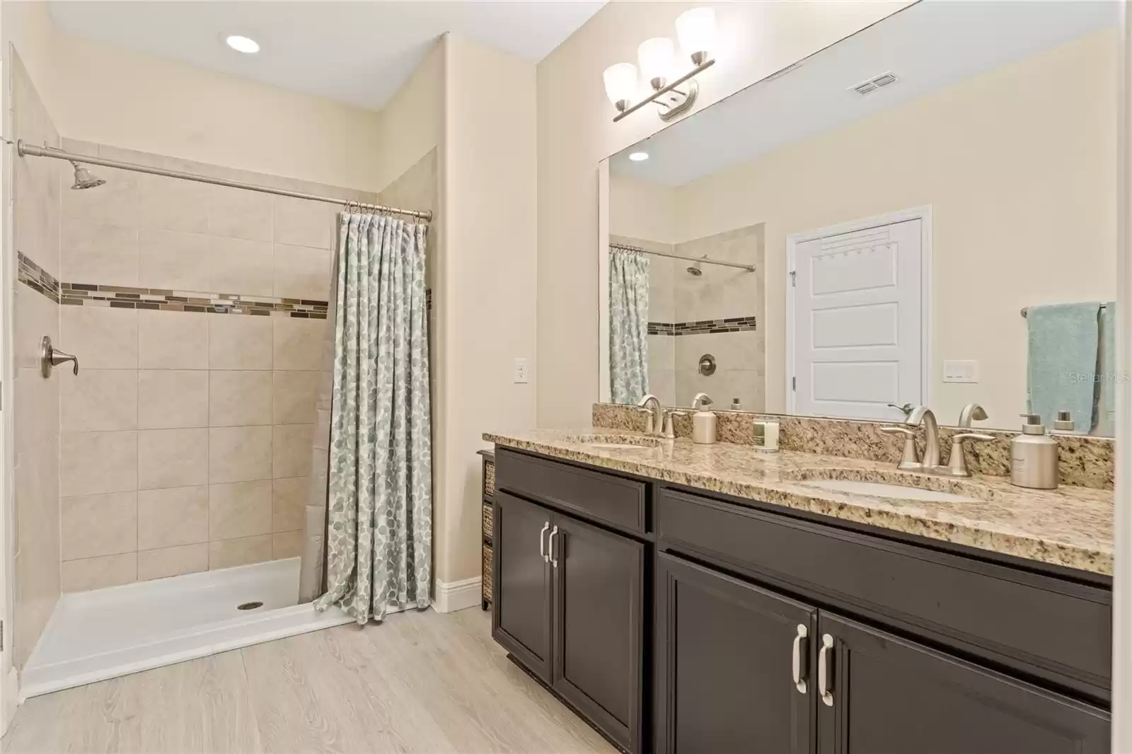 Main bathroom with large walk in shower