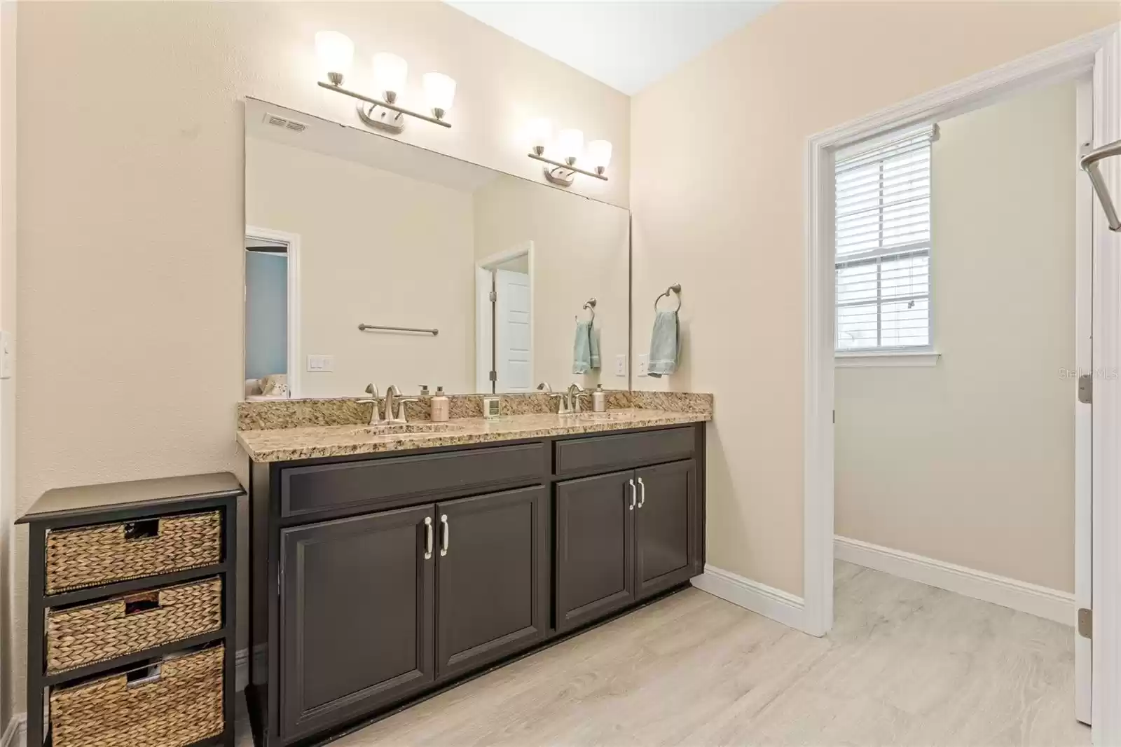 Main bathroom with double vanities