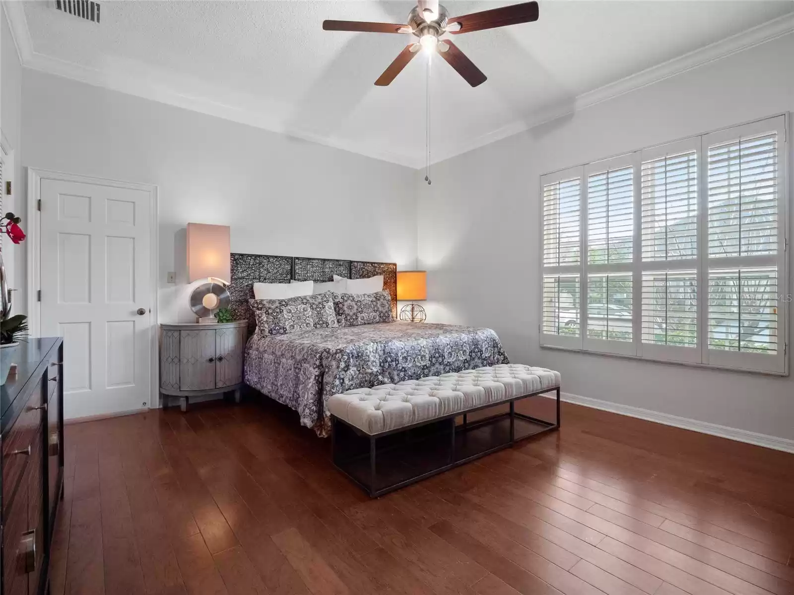 Primary bedroom with shutters