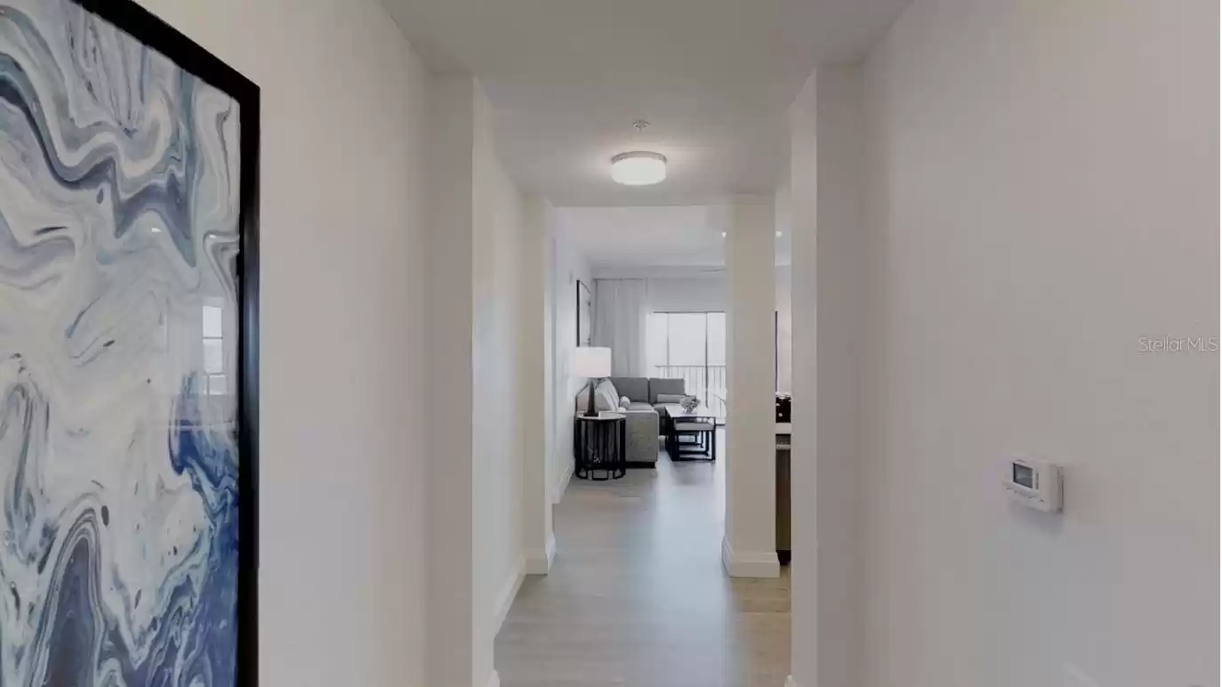 FOYER. NOTE PICTURES ARE OF A SIMILAR CONDO.